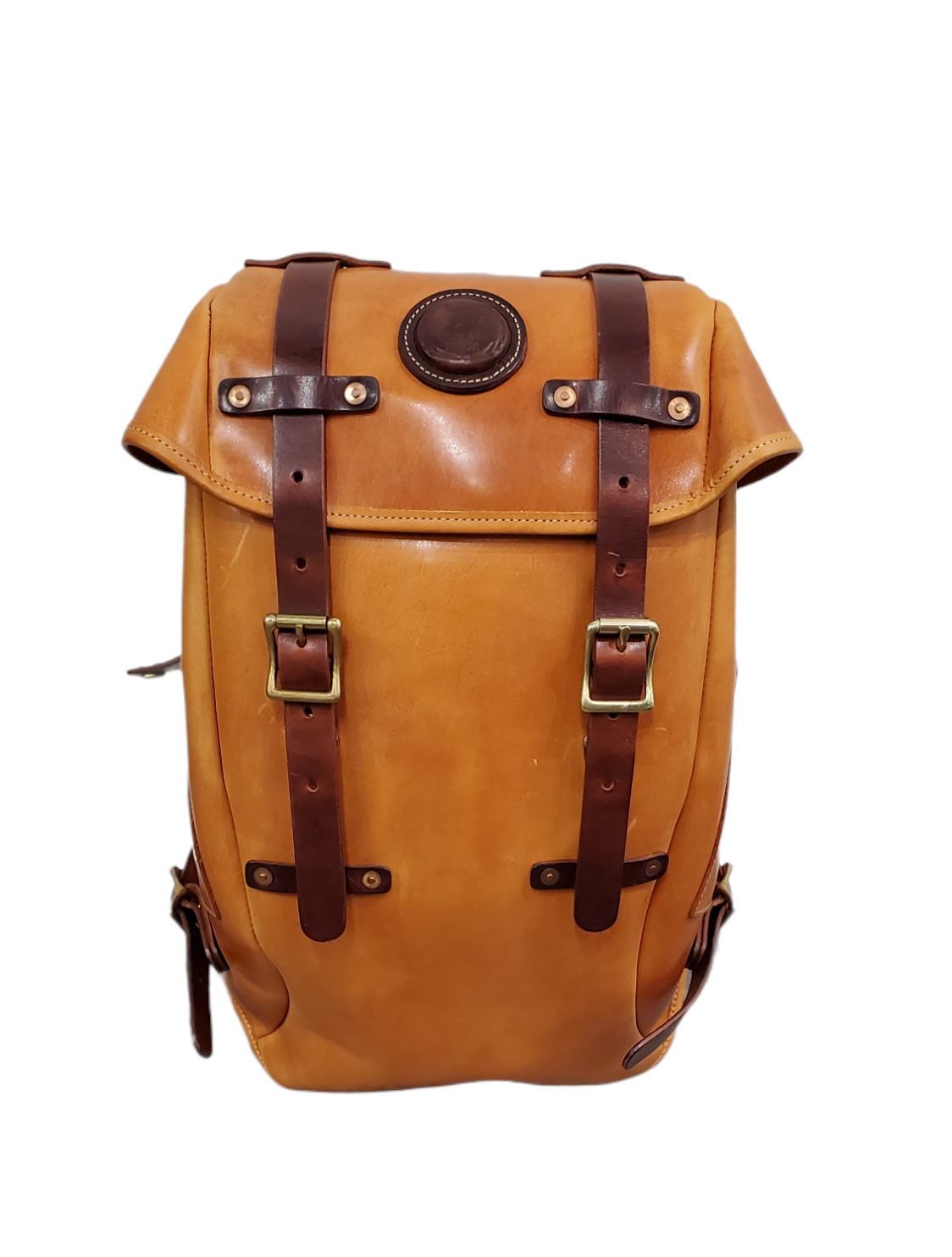 A leather backpack designed by The House Of Rose